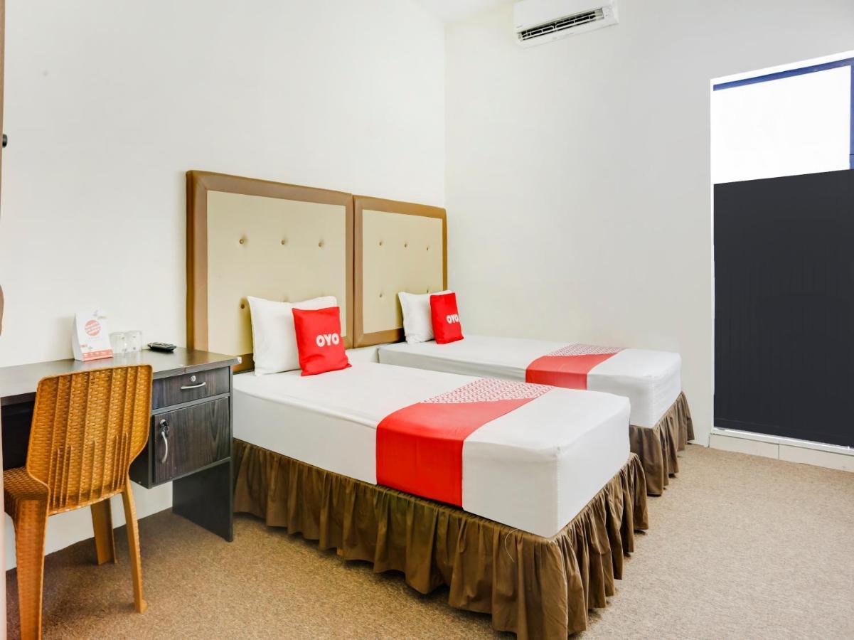 Oyo 3884 Dixie Syariah Guest House Samarinda Esterno foto